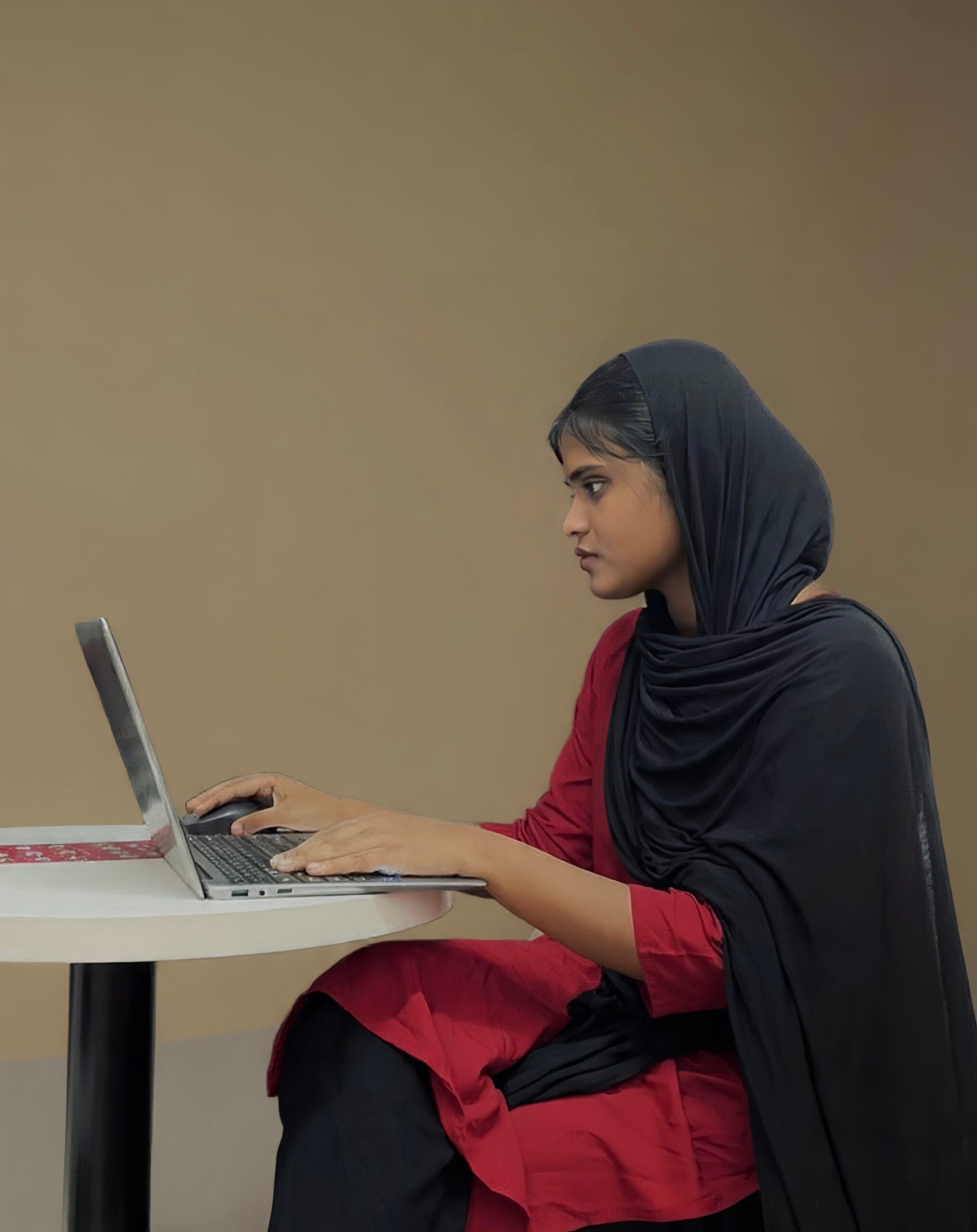 a girl using laptop